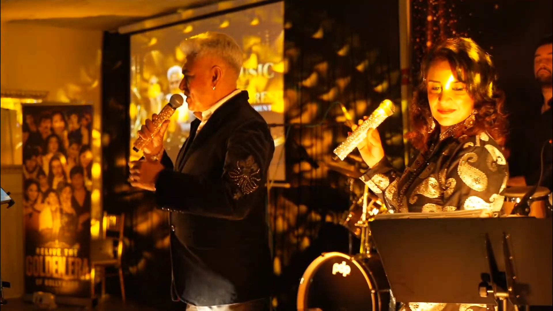 Two performers singing together